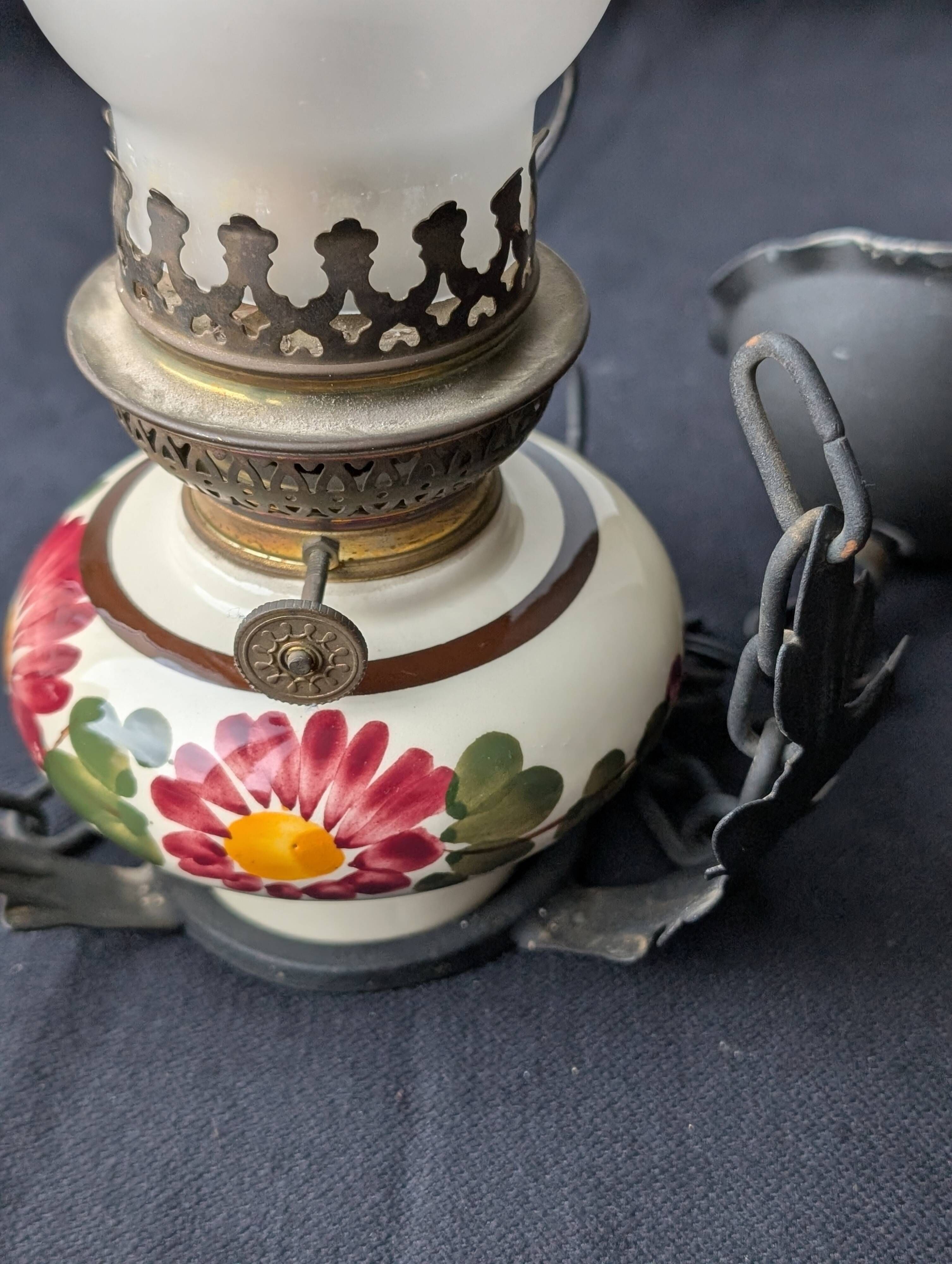 Vintage style suspension oil lamp.