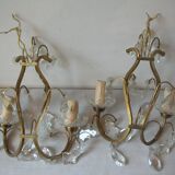 Old pair of double lamp lights with glass and brass pendants, retro decoration