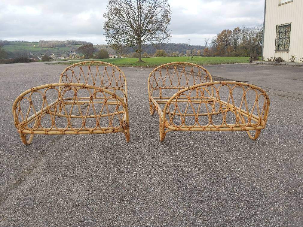 Old rattan bed pair