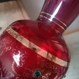 Red vase with gold decoration