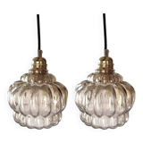 Pair of vintage amber glass pendant lights