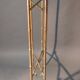 Pedestal table in patinated gilded brass faux foldable bamboo.