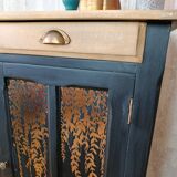 Black Parisian buffet with copper foliage