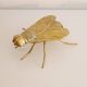 Empty vintage pocket in the shape of a brass insect