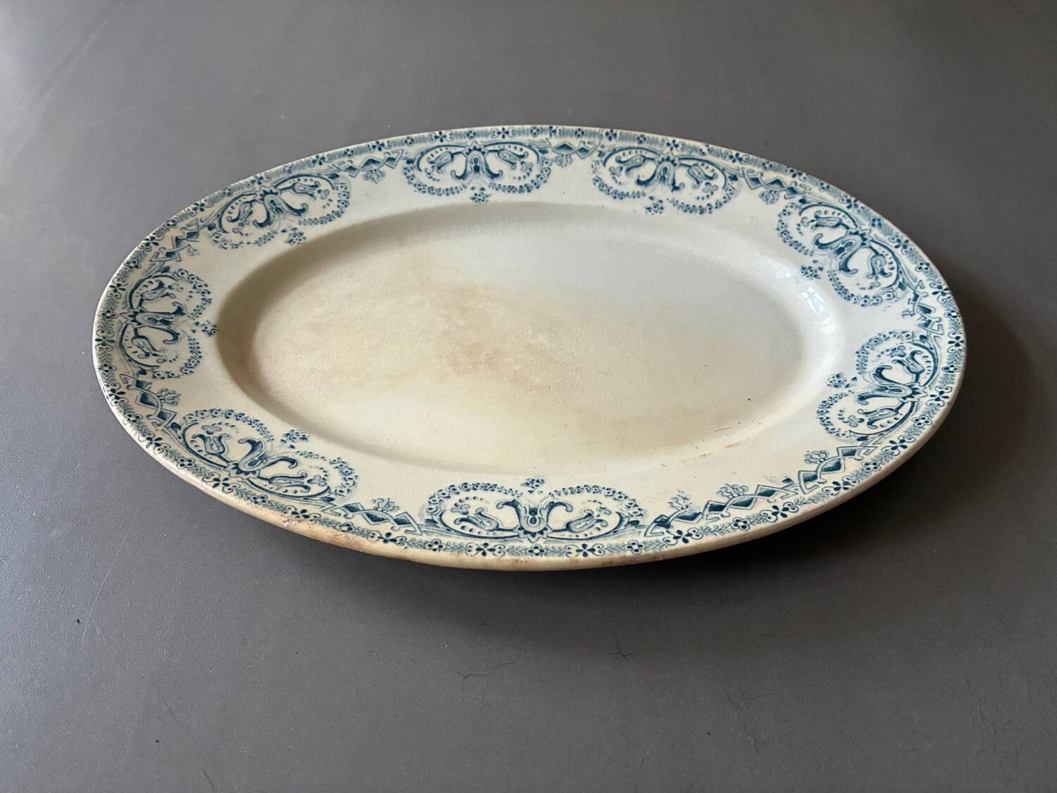 Blue oval plate, garland model, ironstone.