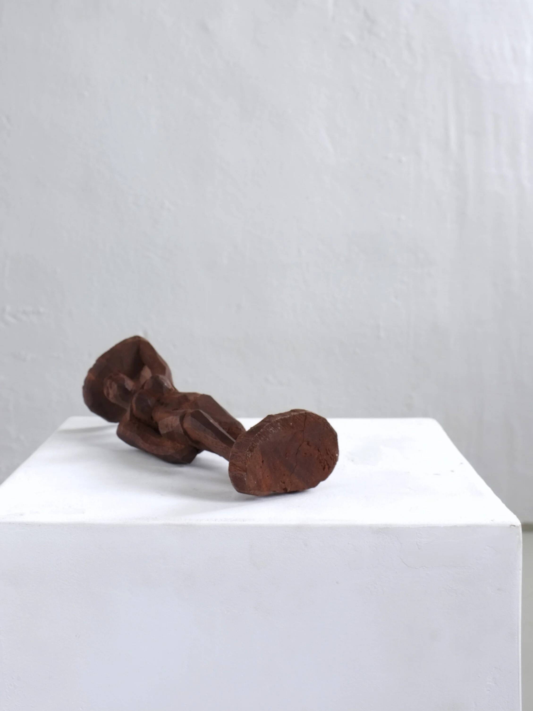 Mid-century hand-carved African woman sculpture