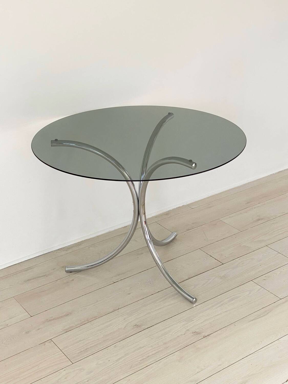 Table for 4 people in smoked glass and metal, 1970.