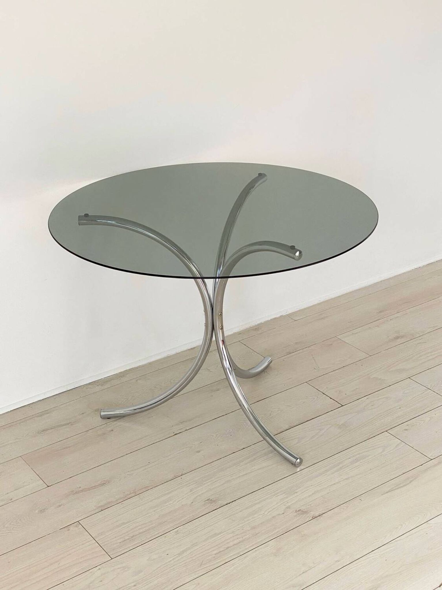 Table for 4 people in smoked glass and metal, 1970.