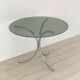 Table for 4 people in smoked glass and metal, 1970.