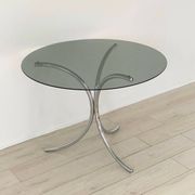 Table for 4 people in smoked glass and metal, 1970.