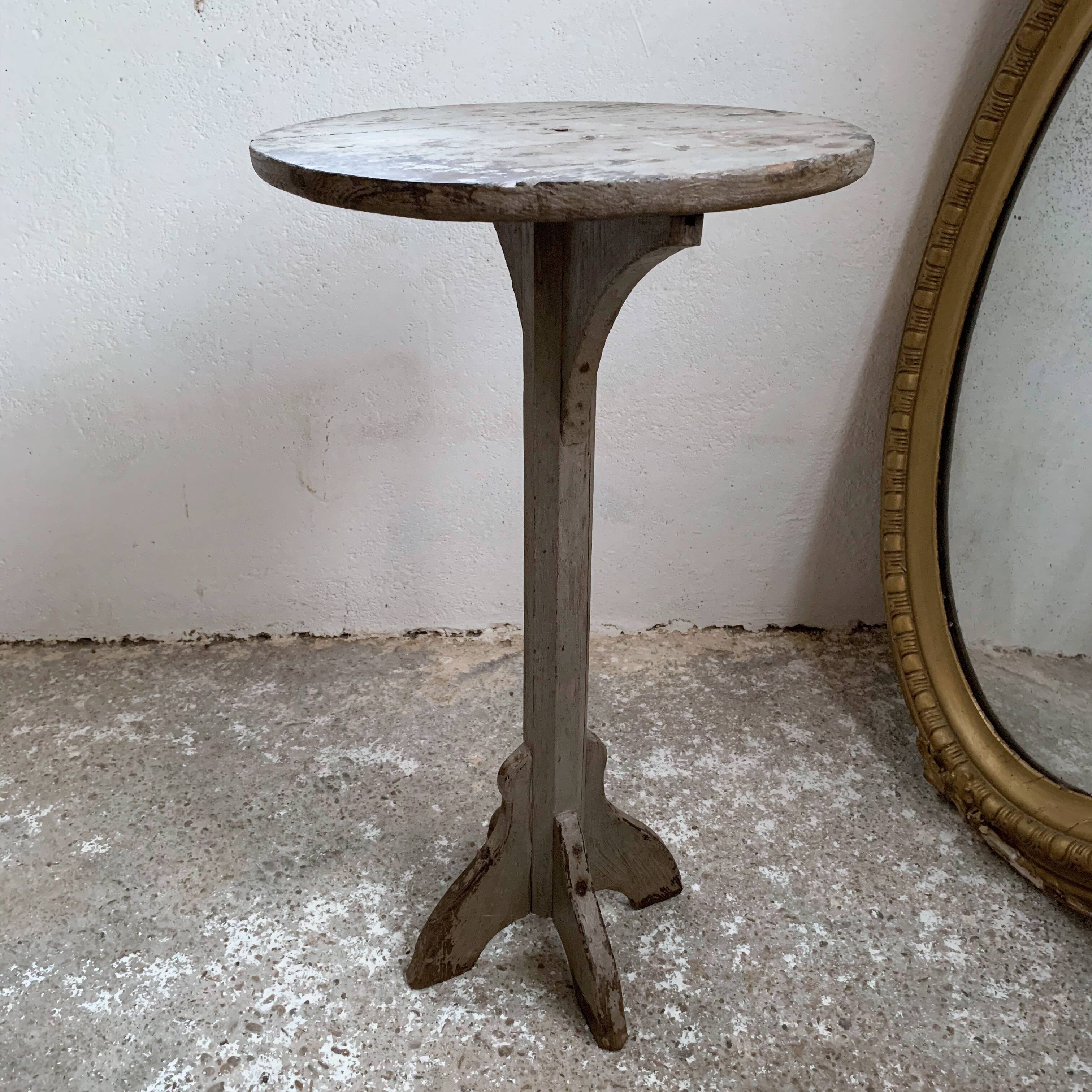 wooden pedestal or primitive winemaker's table