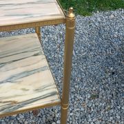 Pair of neoclassical side tables in bronze, brass, marble, and o.