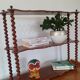 Turned wooden wall shelf