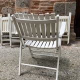 Five wooden garden armchairs