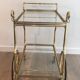 Neo-classical table in gilded metal and glass