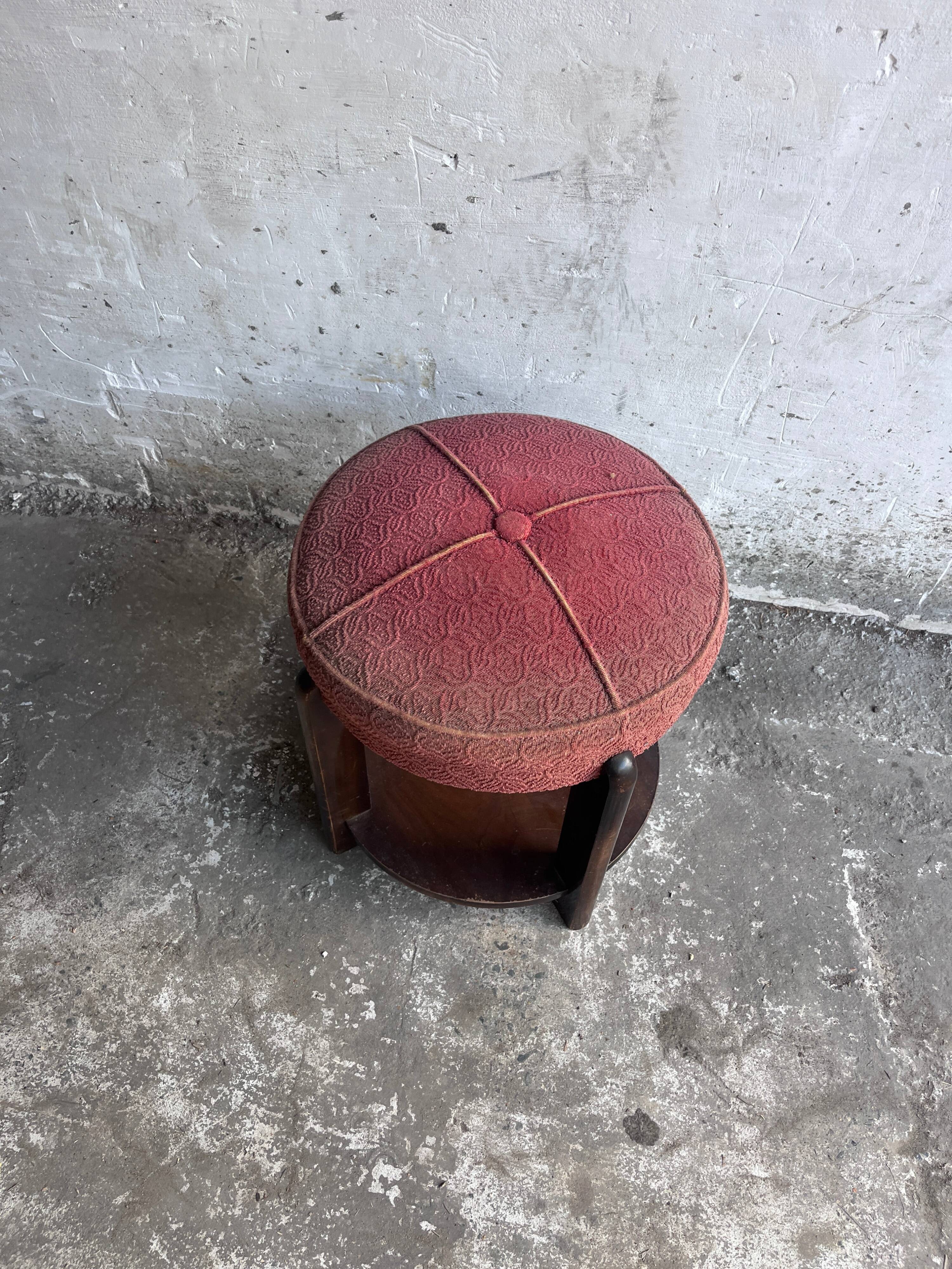 Art Deco stool upholstered with a lower shelf, France, circa 1930.