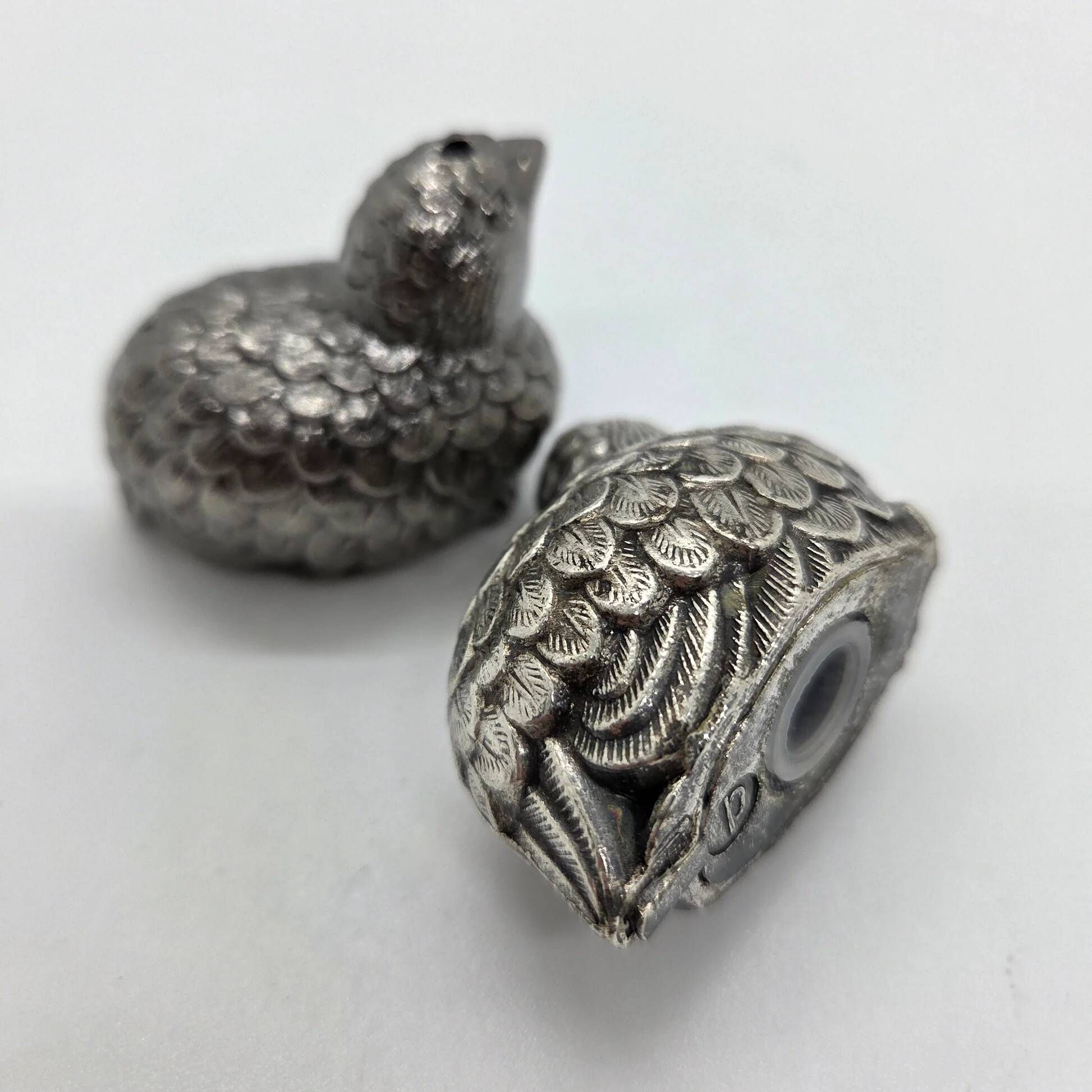 Pair of silver-plated metal bird salt and pepper shakers