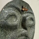 Sculpture face in embossed enamelled brass from the 1960s.