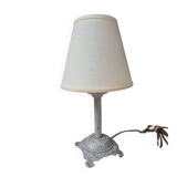 Patinated taupe bedside lamp