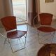 Paire de fauteuils en cuir marron clair