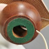 Very rare table lamp in turned teak wood with original braided shade. 1970s