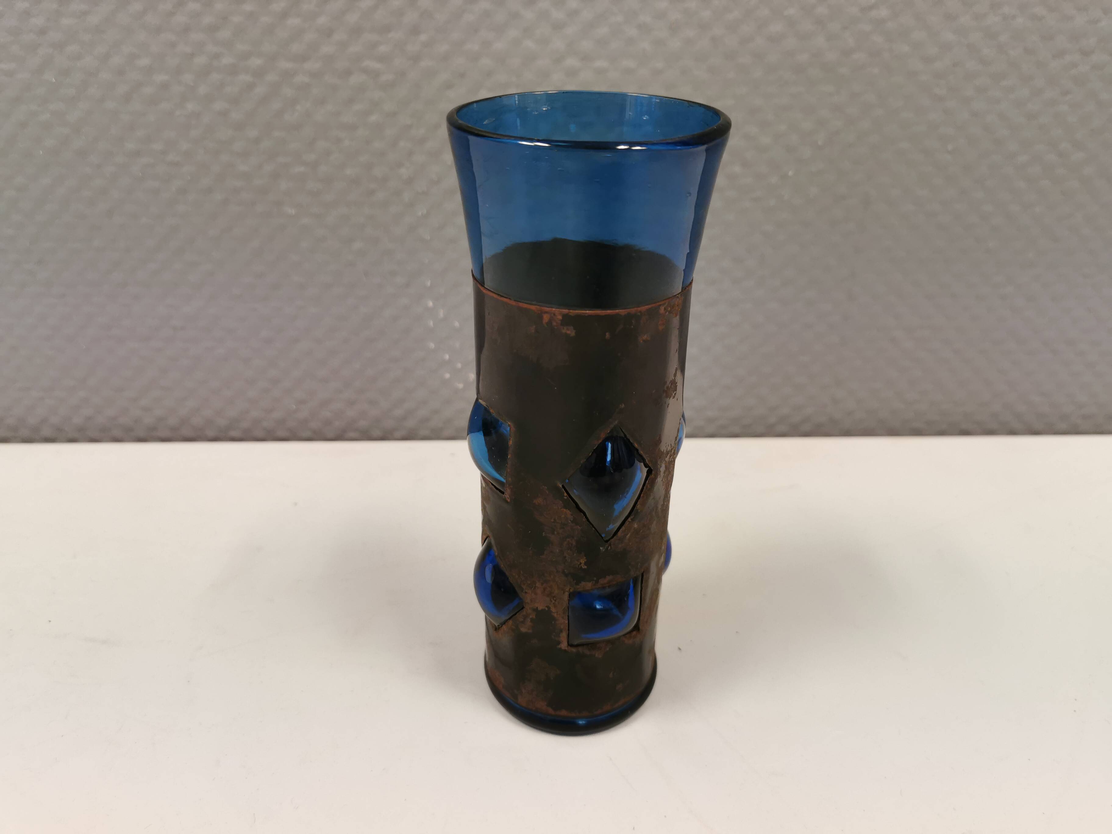 Brutalist style vase with inner blue glass mouth-blown out through the metal "frame".