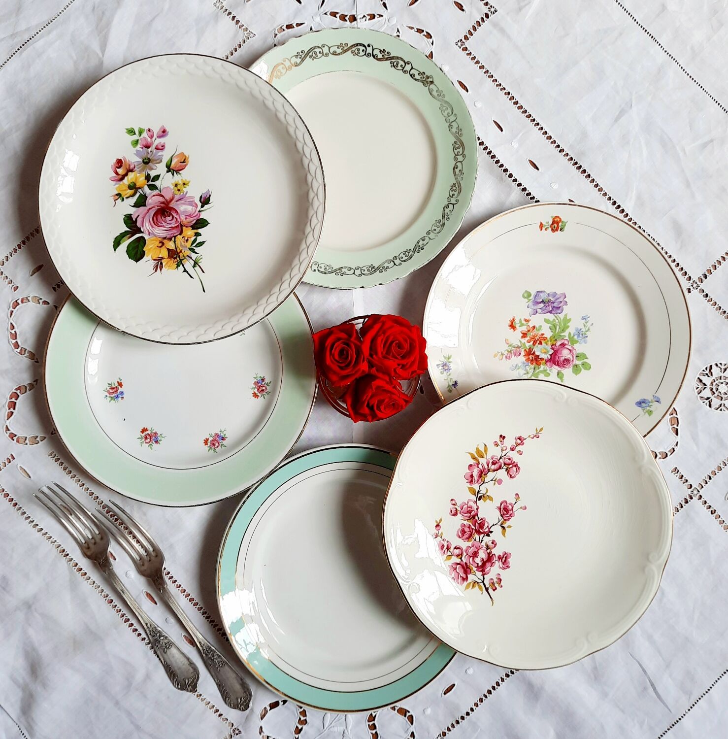 Flat antique earthenware plates with gilded edges