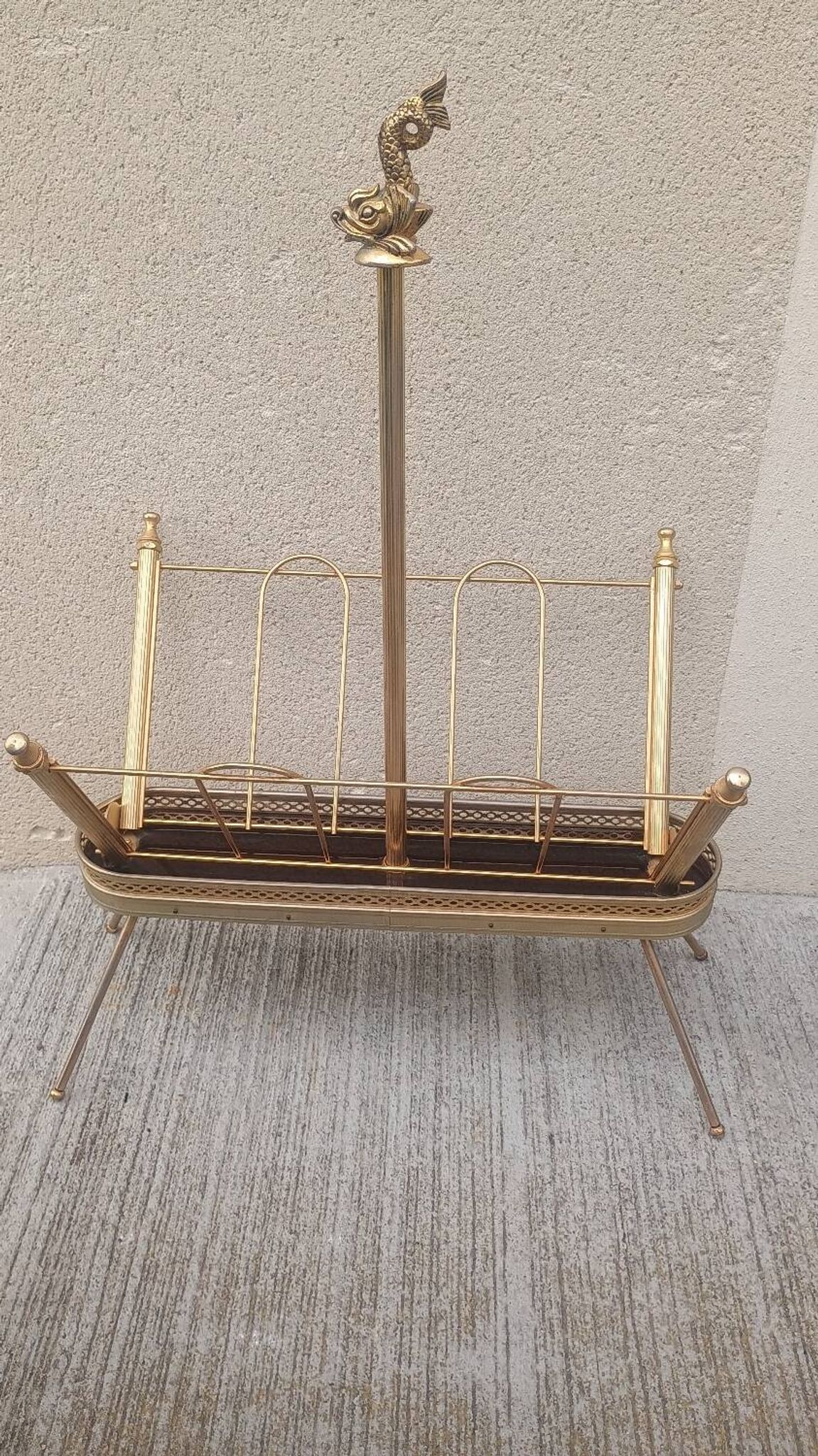 1960s brass folding magazine rack with lacquered wood decoration.