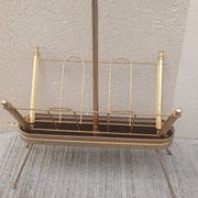 1960s brass folding magazine rack with lacquered wood decoration.