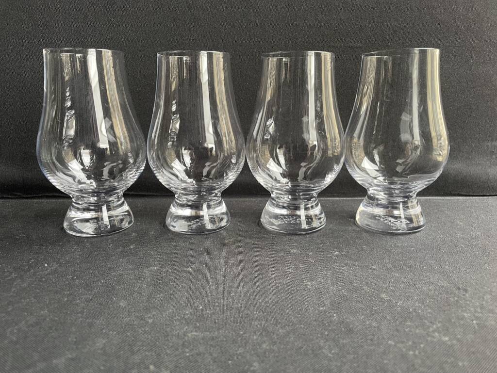 4 crystal whiskey glasses stamped “The Glencairn Glass”