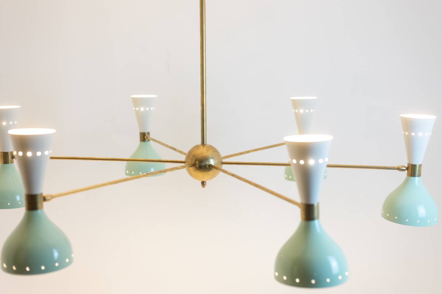 Radiant diablo-shaped chandelier with 12 lights. Contemporary.