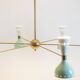 Radiant diablo-shaped chandelier with 12 lights. Contemporary.
