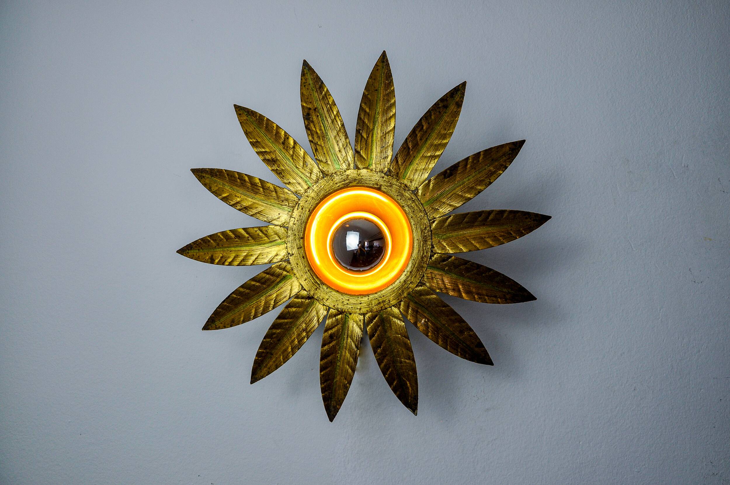 Sun wall lamp by ferro arte, metal and gold leaf, Spain, 1960