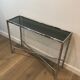 Console and chrome faux-bamboo mirror