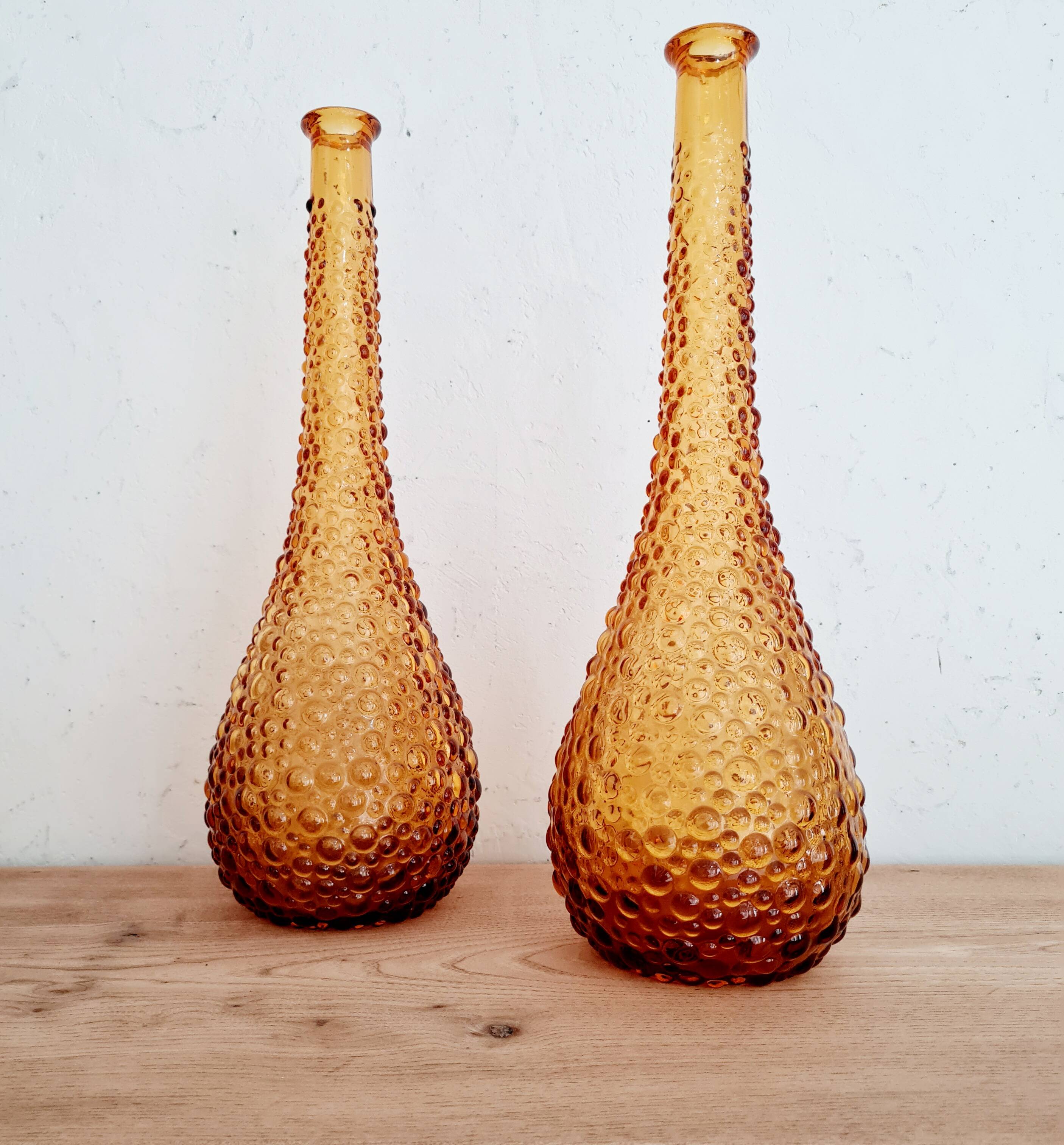 Pair of Italian Empoli vases in amber bubbled glass
