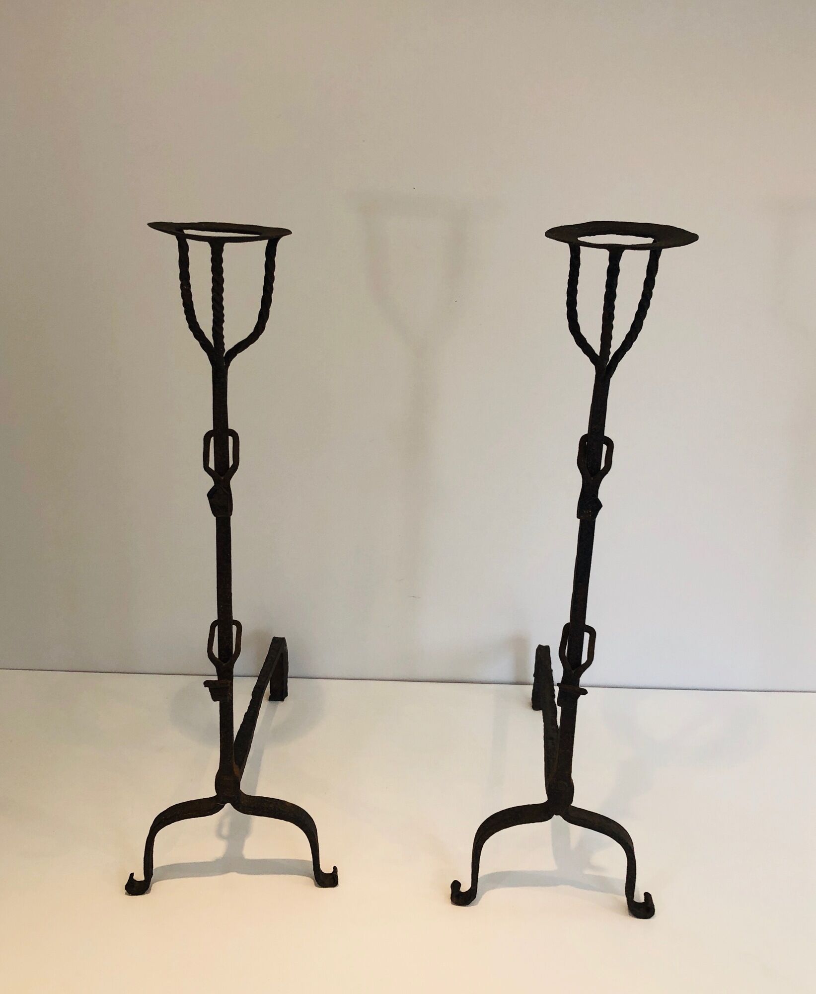 Pair of wrought iron landiers. french work ,seventeenth century