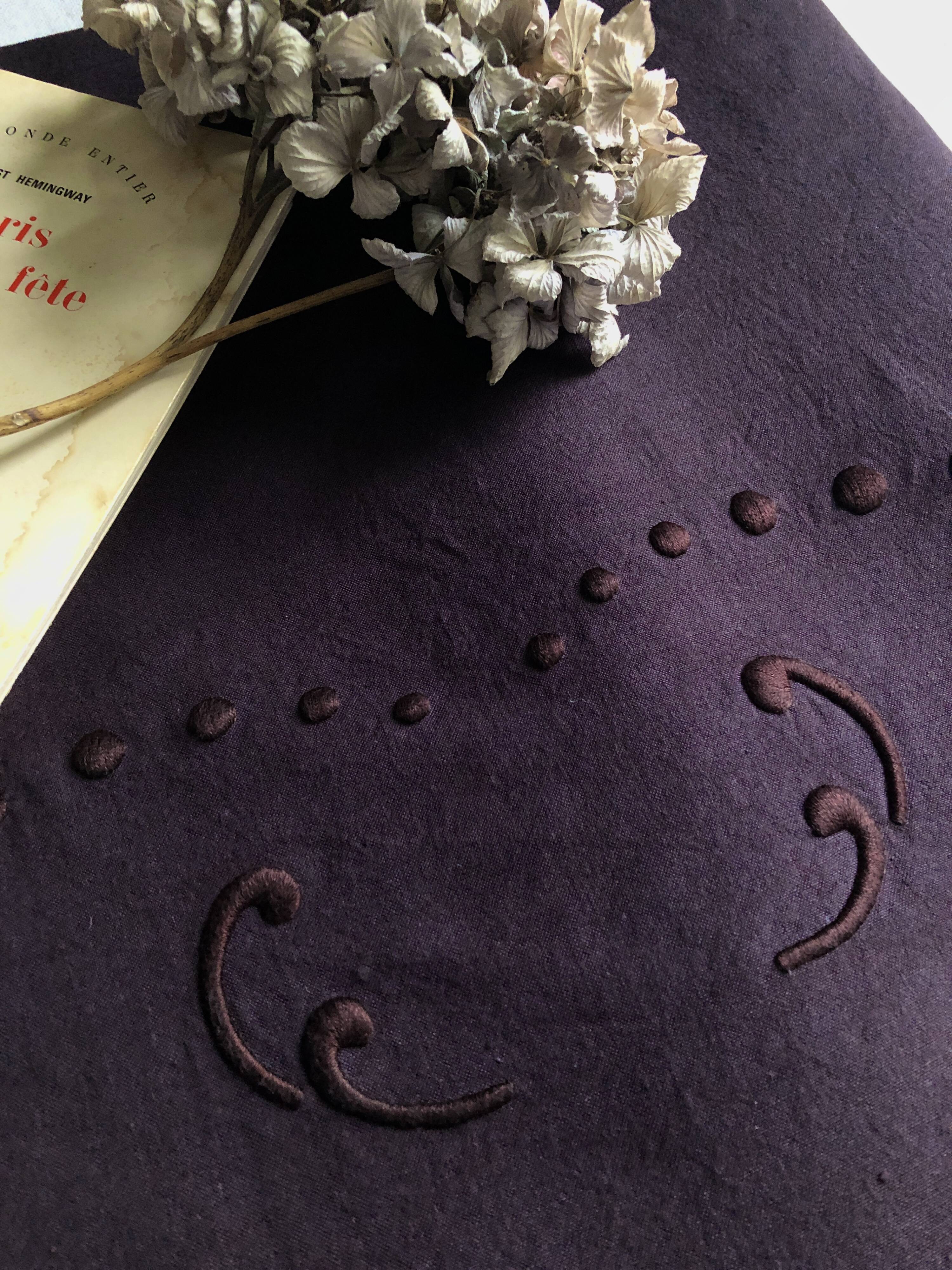 Old linen and cotton sheet tinted eggplant