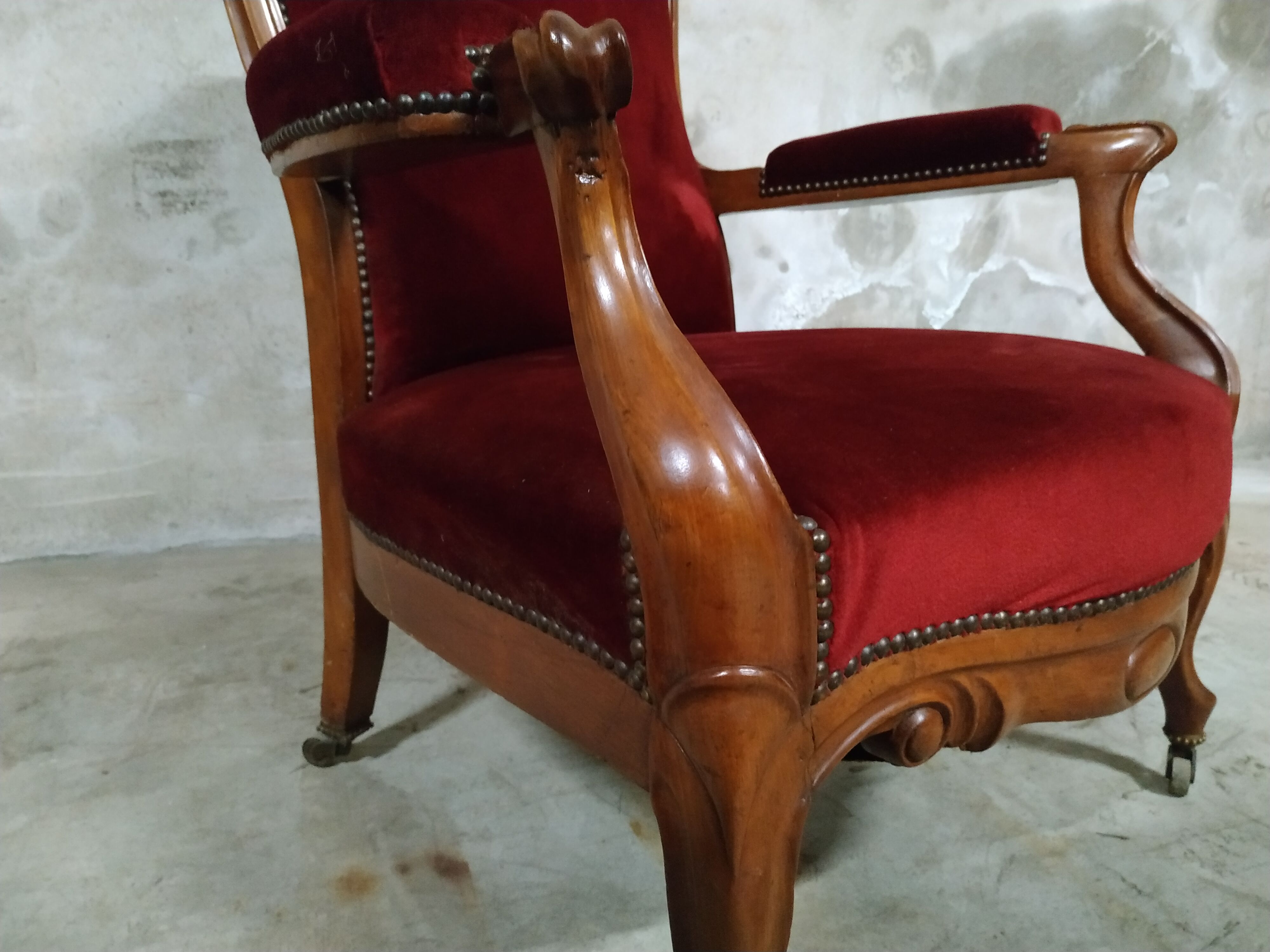 Walnut and velvet armchair