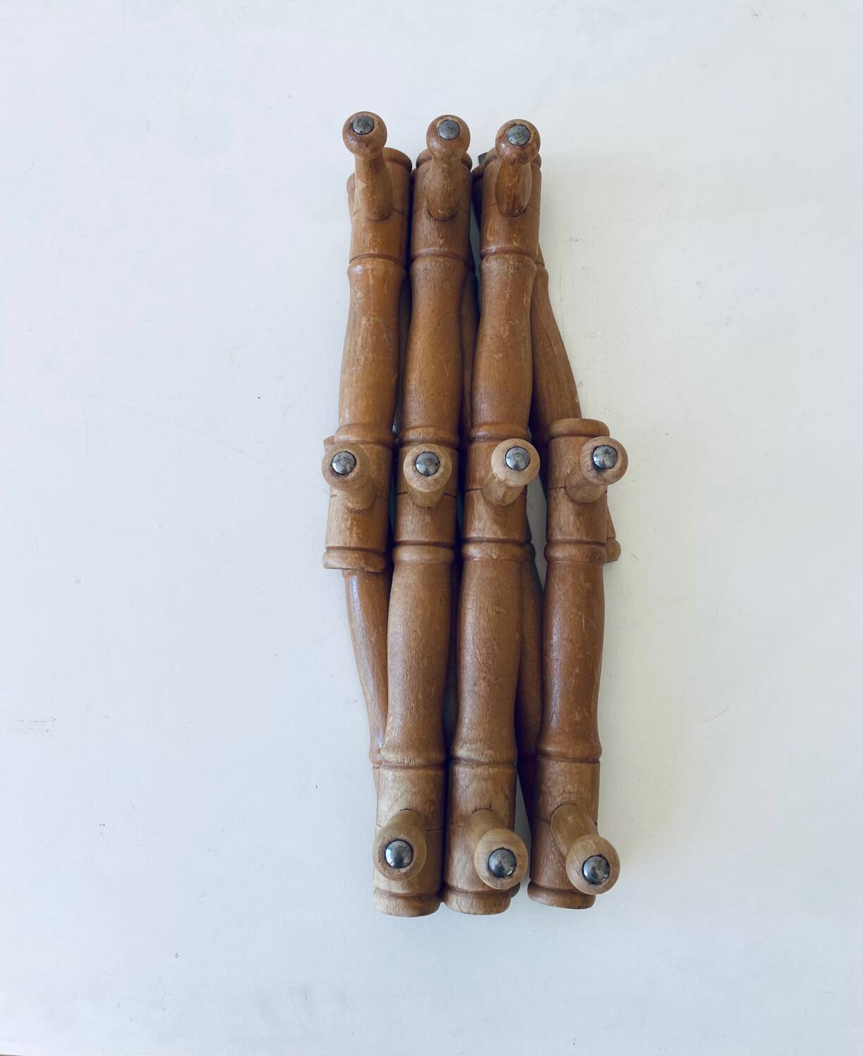 Old wooden wall coat rack
