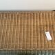 rattan chest of drawers with green details
