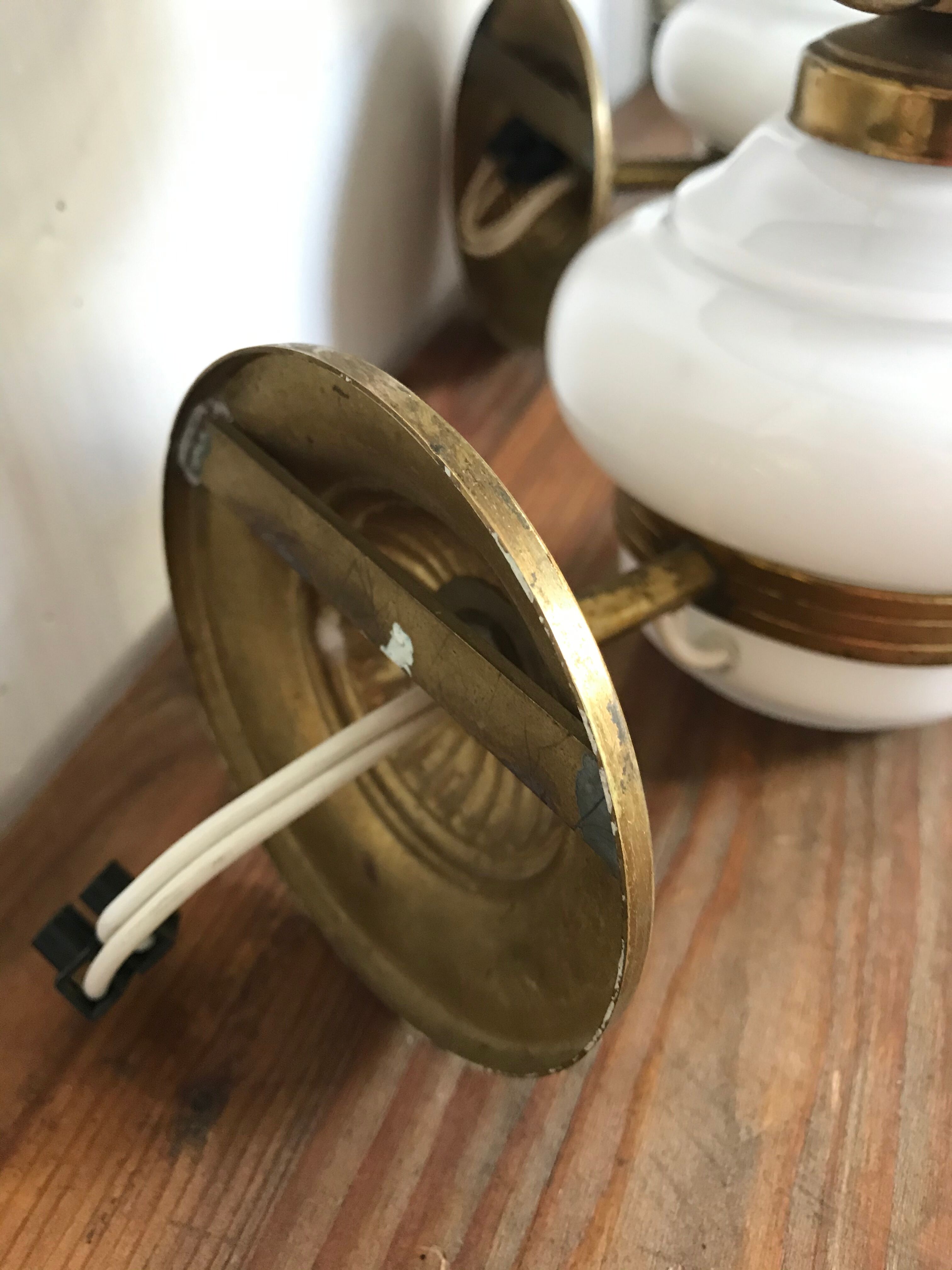 Pair of brass and opaline sconces