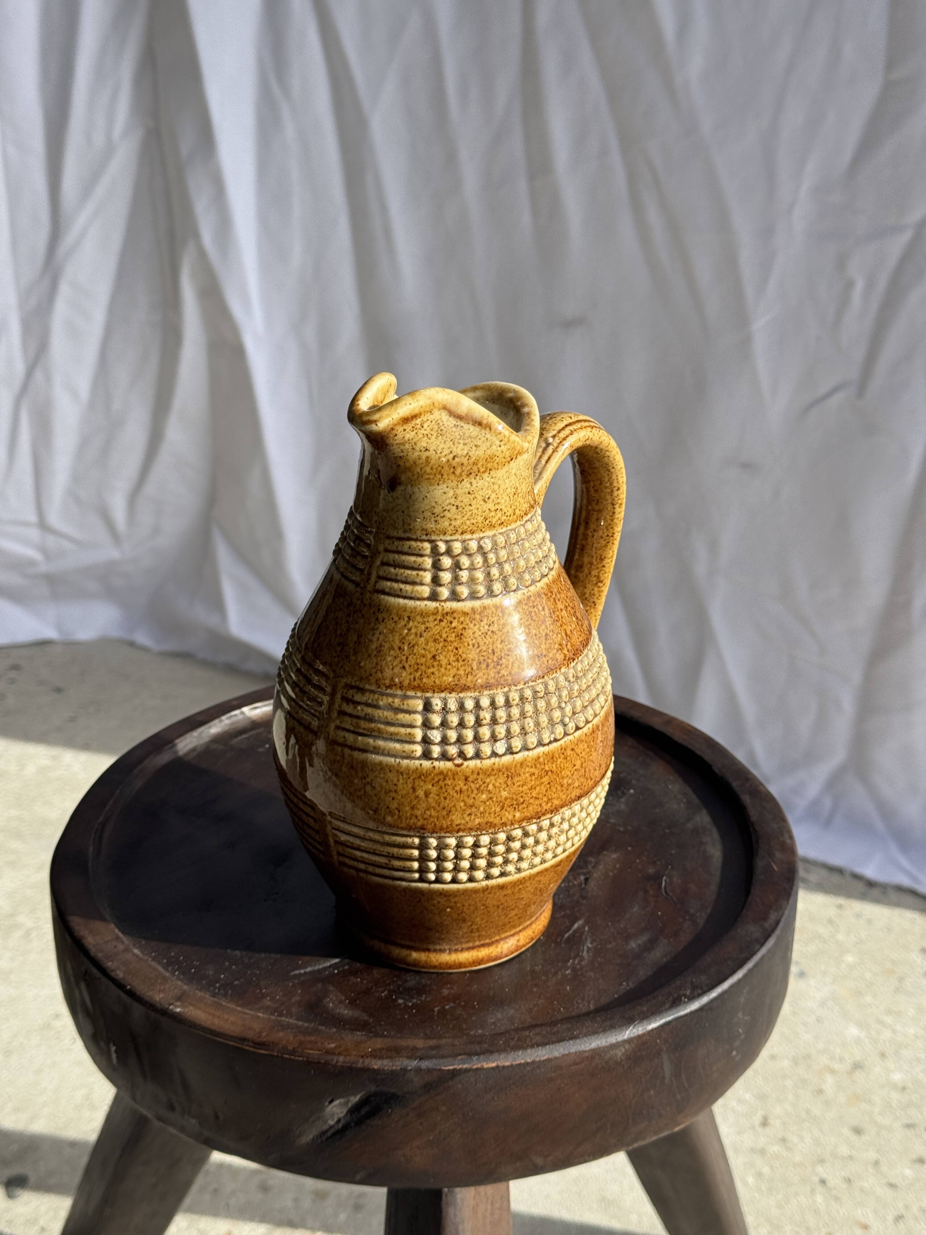 Vintage yellow stoneware carafe with beaded friezes Made in France H22