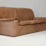 Cinna sofa. Circa 1970. Foam and "caramel" leather. 3 seats.