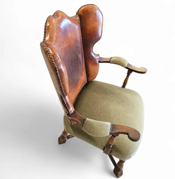 Rare fauteuil à oreilles en cuir et chêne conçu par Theo Ruth pour Artifort / f 297 de 1949