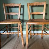 Pair of vintage chairs from the late 20th century with caning.