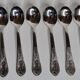 Set of six "Burgsil" stainless steel teaspoons with rabbit decoration