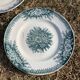 Set of 8 mismatched iron earth flat plates