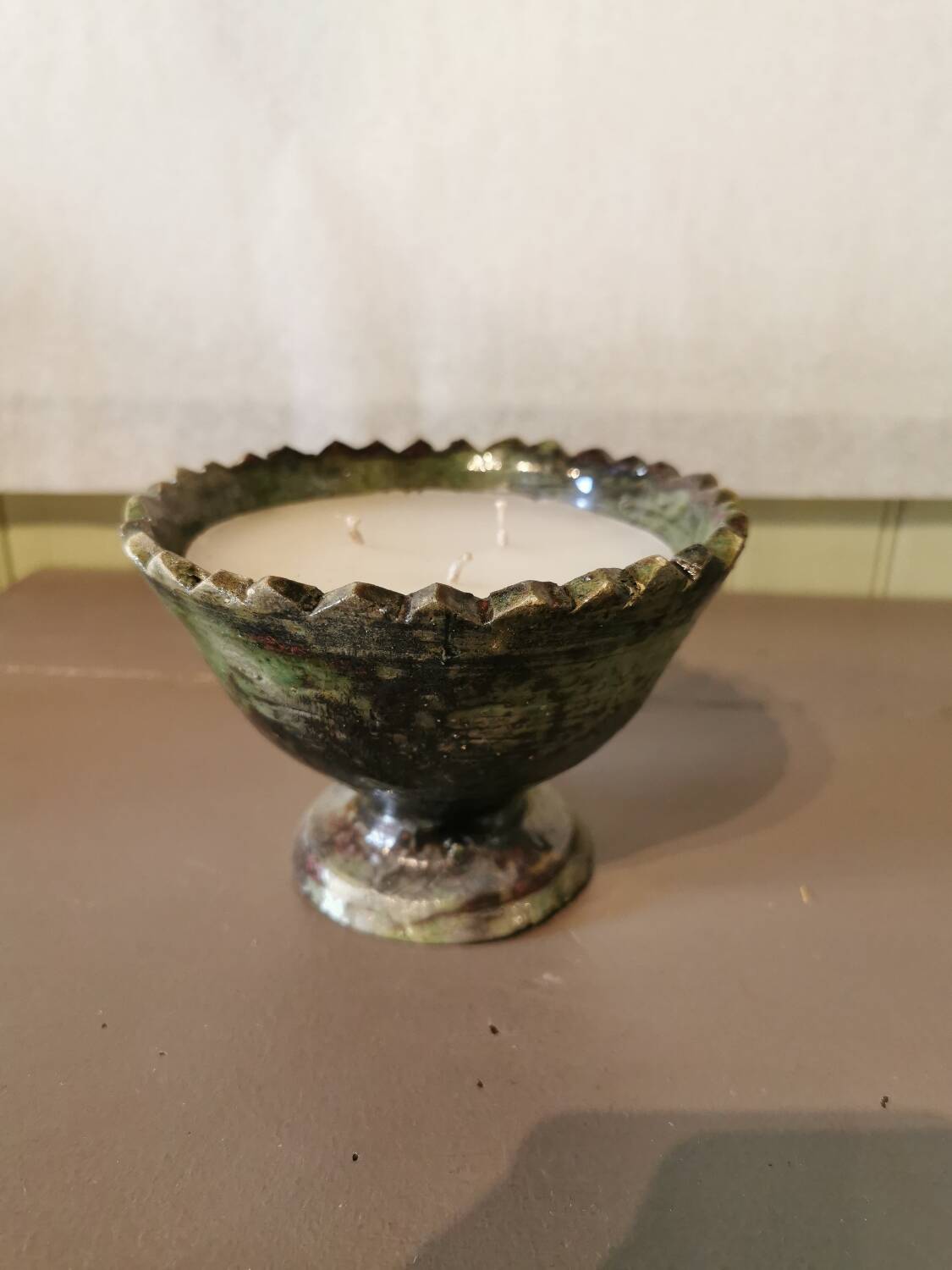 Candle in Tamegroute bowl. Amber