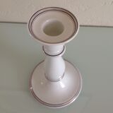 Old white earthenware candlestick