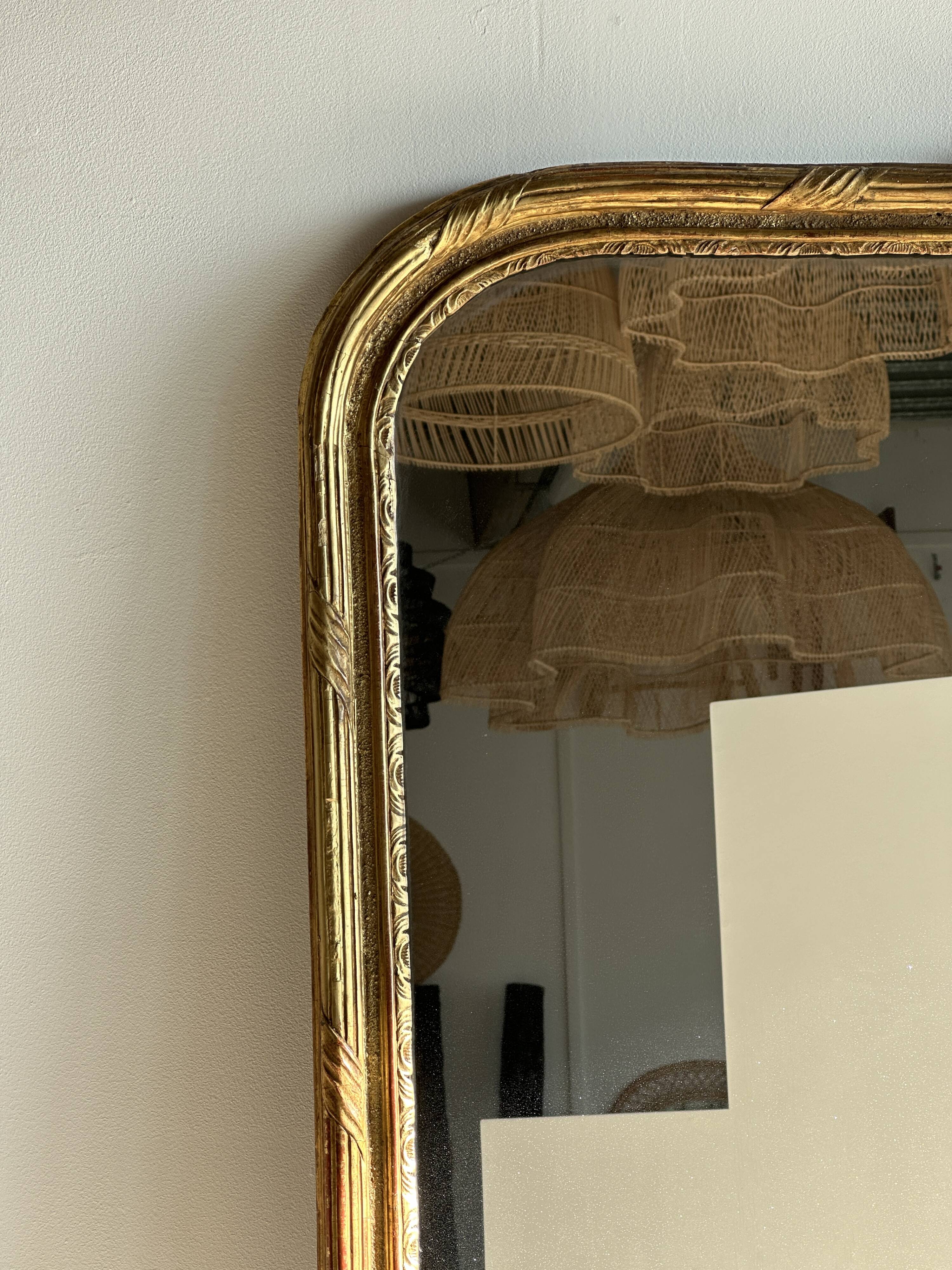 Large gilded mirror 19th century rounded corners mercury glass Louis XVI style